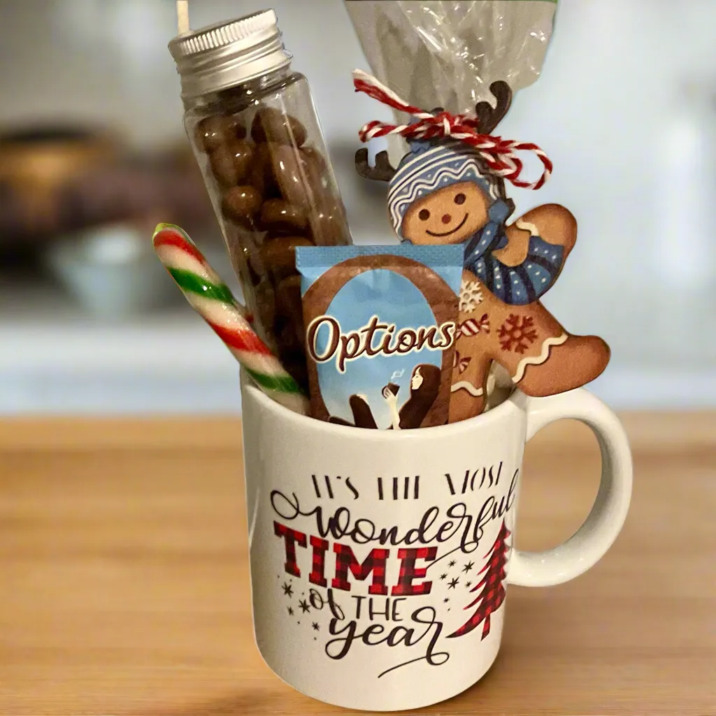 a christmas ceramic mug, hot chocolate marsh mallows, chocolate & sweets