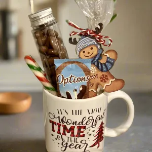 a christmas ceramic mug, hot chocolate marsh mallows, chocolate & sweets