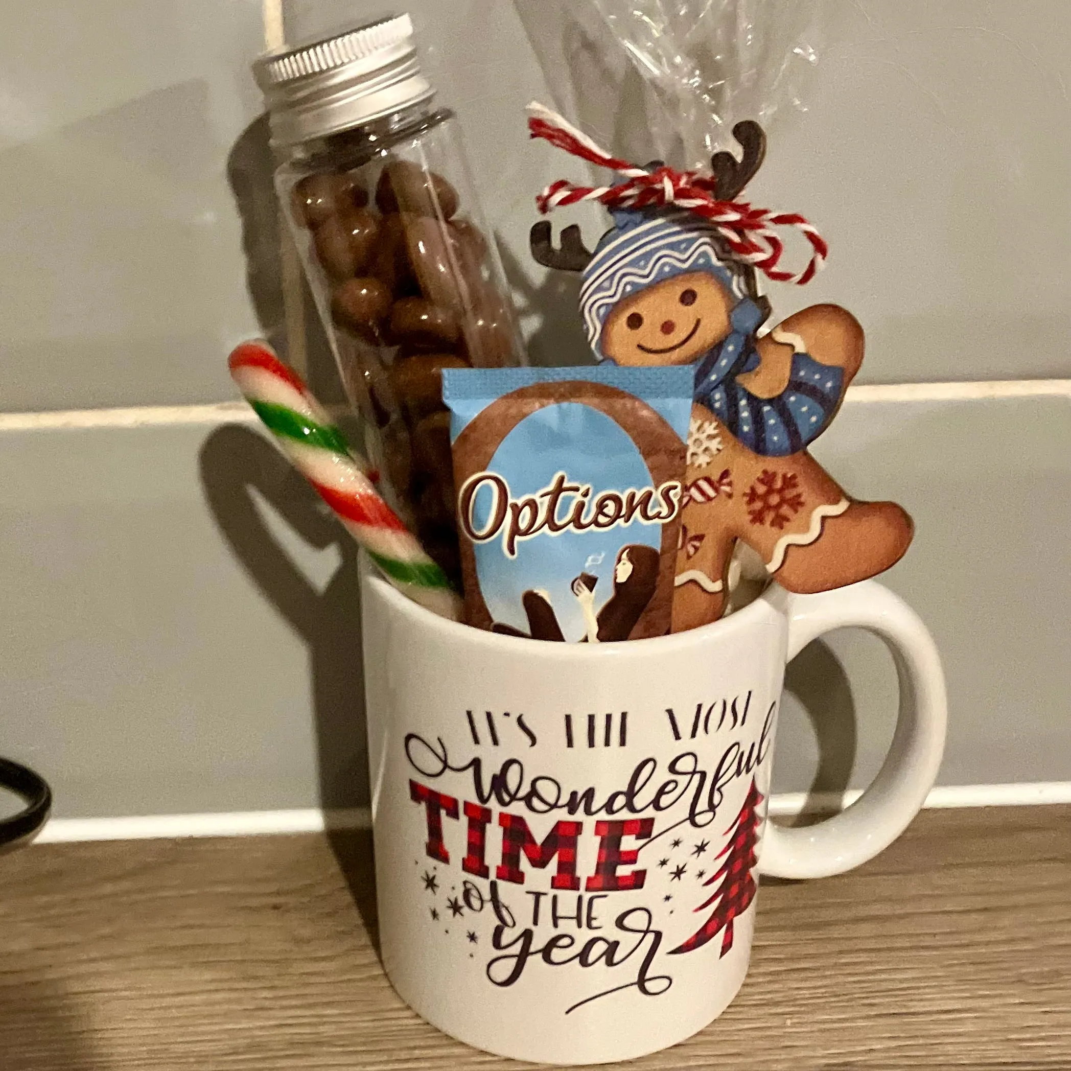 a christmas ceramic mug, hot chocolate marsh mallows, chocolate & sweets