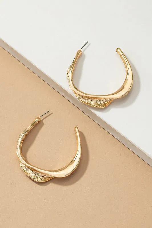 Twisted metal hoop earrings